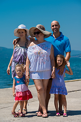 Image showing Portrait of happy multi generation family by the sea