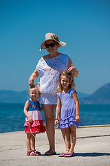 Image showing Portrait of a grandmother with her cute little granddaughters by