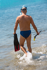 Image showing fisherman preparing for underwater fishing