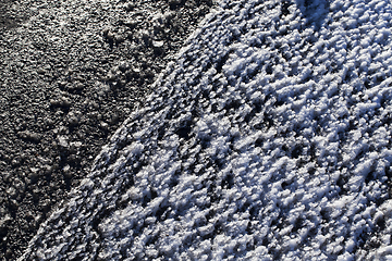 Image showing Asphalt road under the snow