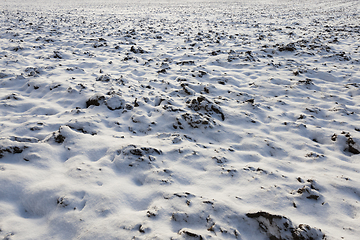 Image showing covered with snow plowed earth