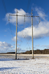 Image showing electric poles, winter