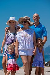 Image showing Portrait of happy multi generation family by the sea