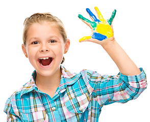 Image showing Portrait of a cute girl playing with paints