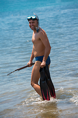 Image showing fisherman preparing for underwater fishing