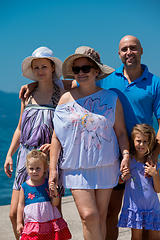 Image showing Portrait of happy multi generation family by the sea