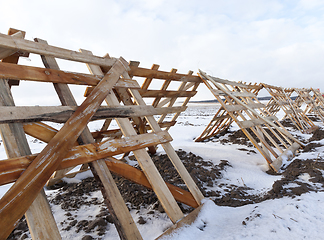 Image showing Wooden fences in the field