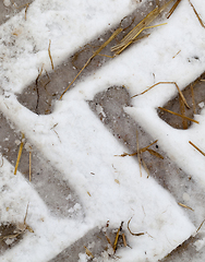 Image showing Traces of the car on the snow