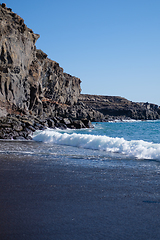 Image showing beautiful wild beach with black sand