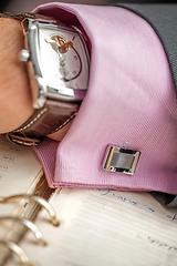 Image showing Expensive watch on a businessman's hand.