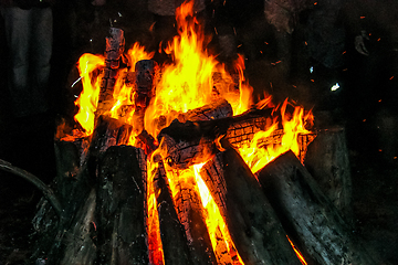 Image showing Flames of the campfire in the night.