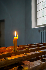 Image showing Burning candle at Koknese Evangelical Lutheran Church.