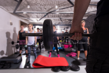 Image showing sporty women using barbells while exercises