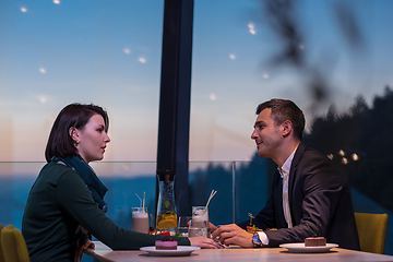 Image showing loving couple enjoying romantic dinner