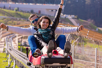 Image showing couple driving on alpine coaster