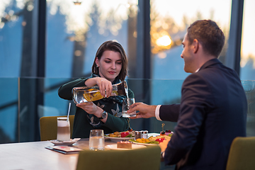 Image showing loving couple enjoying romantic dinner