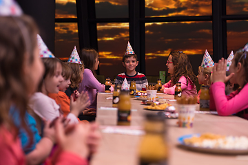 Image showing young boy having birthday party