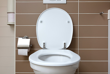 Image showing White toilet bowl in the bathroom