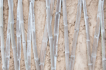 Image showing Bamboo texture in poured concrete wall