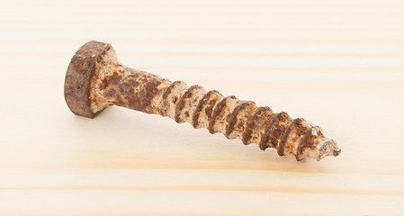 Image showing Rusted old screw isolated