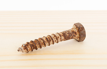 Image showing Rusted old screw isolated