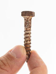 Image showing Rusted old screw isolated