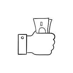 Image showing Hand holding money hand drawn outline doodle icon.