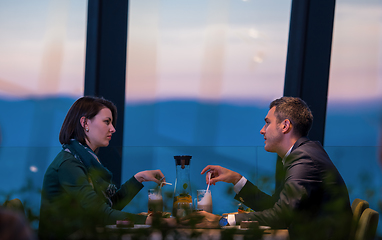 Image showing loving couple enjoying romantic dinner