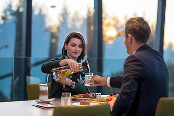 Image showing loving couple enjoying romantic dinner