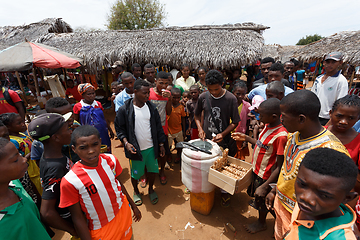 Image showing Man sell ice cream on rural Madagascar marketplace