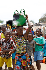 Image showing Malagasy woman transport cargo on head