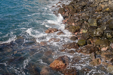 Image showing beautiful wild beach with black sand