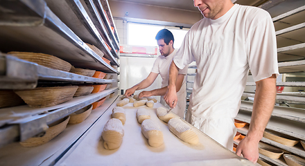 Image showing bakers preparing the dough