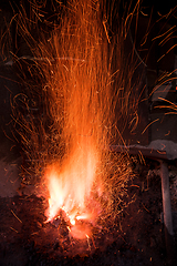 Image showing Traditional blacksmith furnace with burning fire