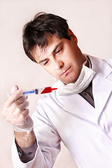 Image showing Doctor with syringe