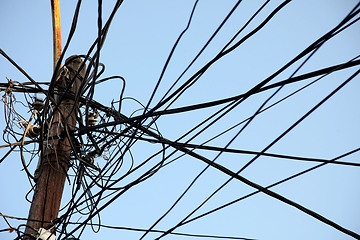 Image showing A tangle of electricity and communications cables, television aerials, satellite dishes in Prizren