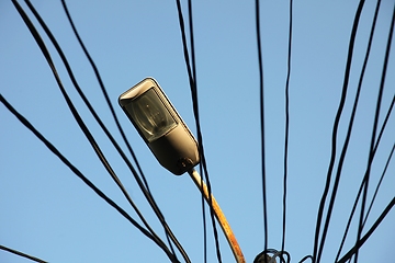 Image showing A tangle of electricity and communications cables, television aerials, satellite dishes in Prizren