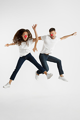 Image showing Portrait of beautiful couple celebrating red nose day on white studio background