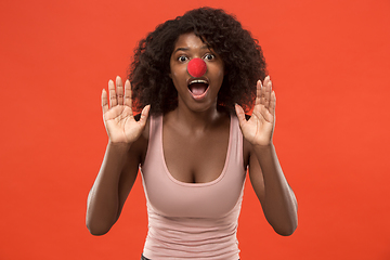 Image showing Portrait of young african-american woman celebrating red nose day