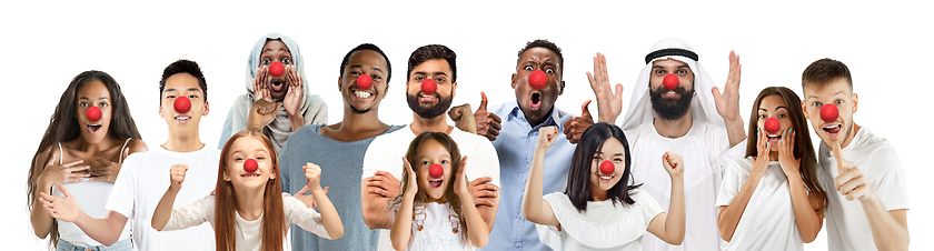 Image showing Portrait of young people celebrating red nose day on white background