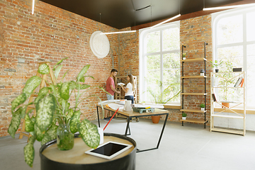 Image showing Young couple doing apartment repair together themselves