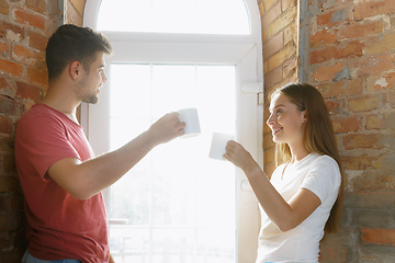 Image showing Young couple doing apartment repair together themselves