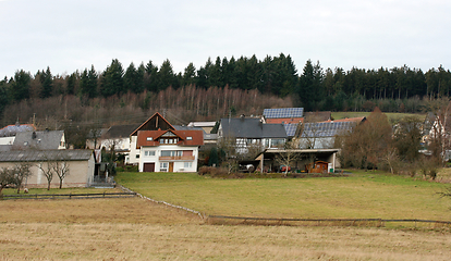 Image showing Häuser im Wald  Homes in the Forest  