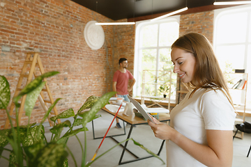 Image showing Young couple doing apartment repair together themselves