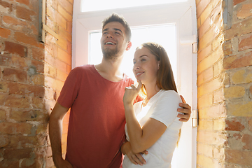 Image showing Young couple doing apartment repair together themselves