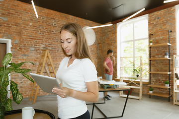 Image showing Young couple doing apartment repair together themselves