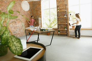 Image showing Young couple doing apartment repair together themselves