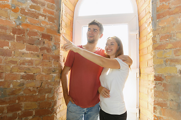 Image showing Young couple doing apartment repair together themselves