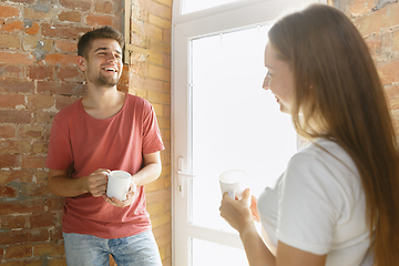 Image showing Young couple doing apartment repair together themselves