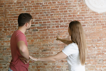 Image showing Young couple doing apartment repair together themselves